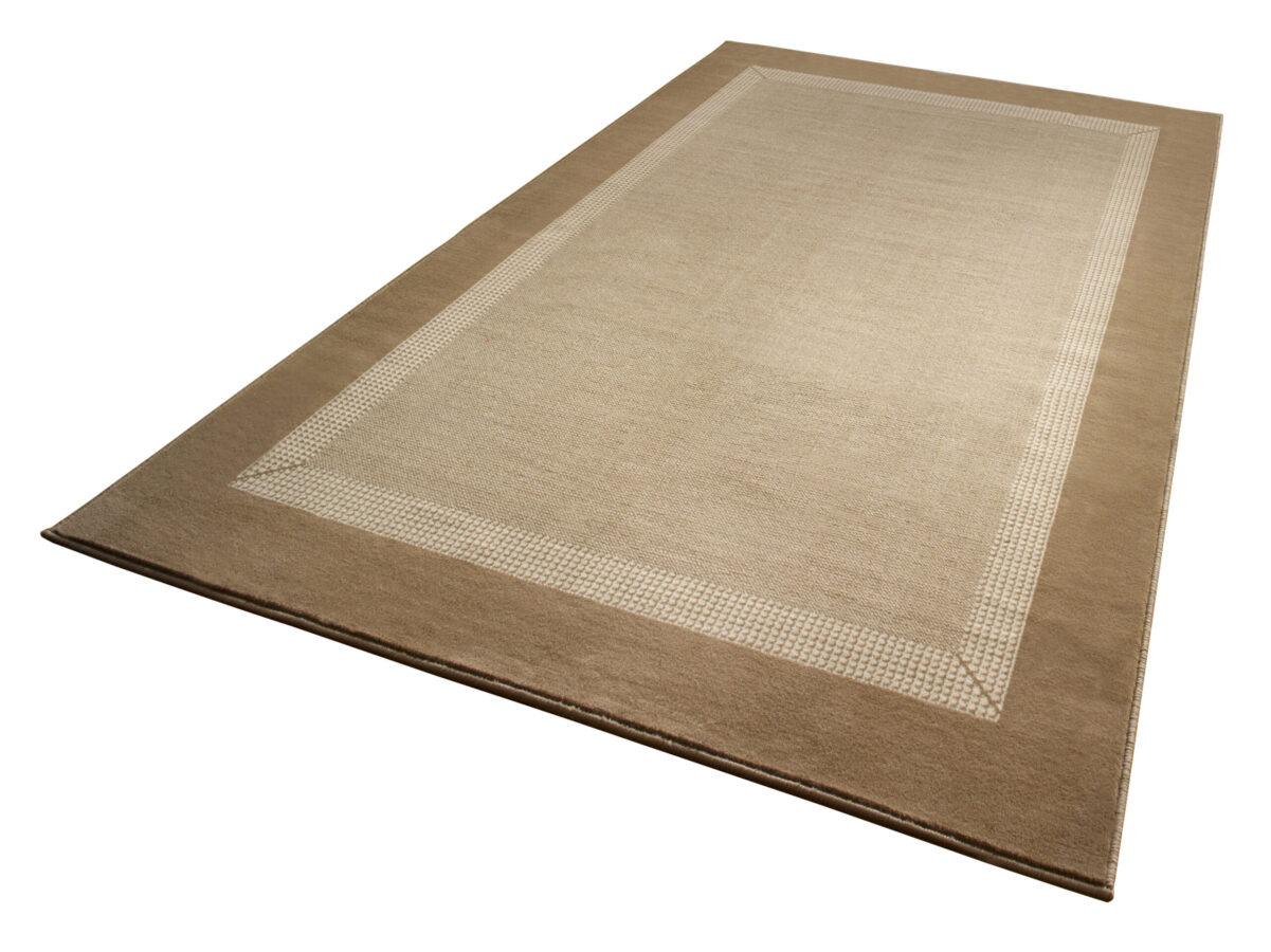 Creme lavet af 100% Polypropylen med en bagside af Jute