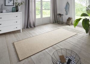 Bouclé  tæppe i farven Beige lavet af 100% Polypropylen med en bagside af Latex