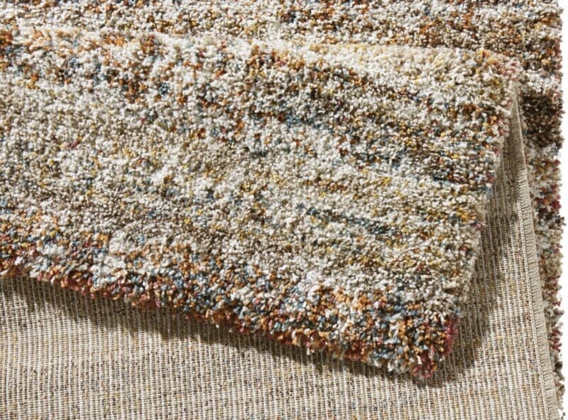 Chloe tæppe i farven Brun mottled lavet af 100% Polypropylen med en bagside af Jute