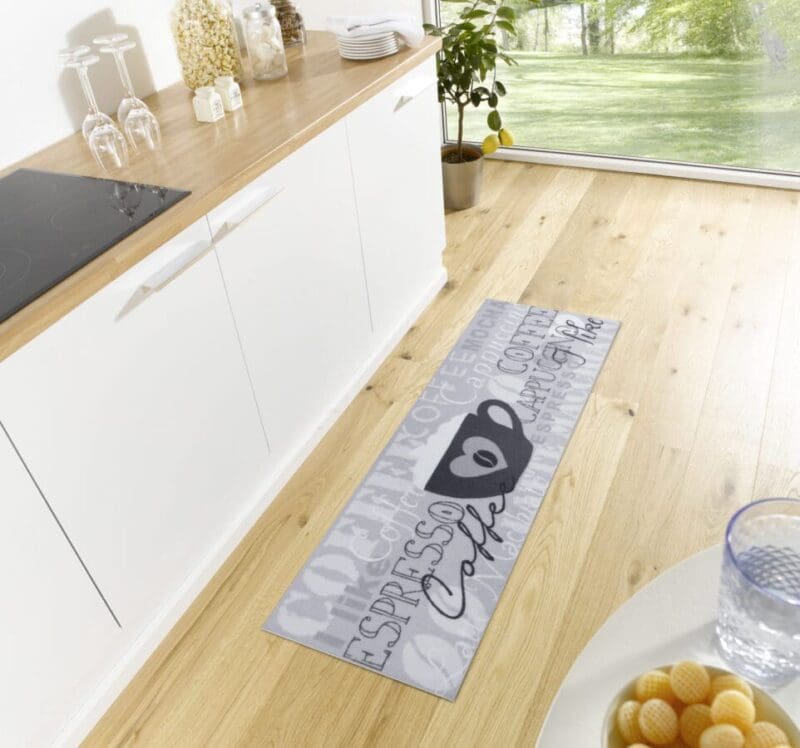 Cook&Clean tæppe i farven Grå Sort Hvid lavet af 100% Polyester med en bagside af 80% Gummi