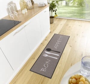 Cook&Clean tæppe i farven Brun Hvid lavet af 100% Polyester med en bagside af 80% Gummi