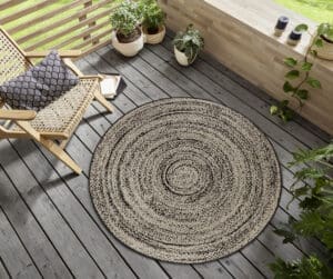 Rund Mix tæppe i farven Creme Sort lavet af 100% Polypropylen med en bagside af 100% Polypropylen