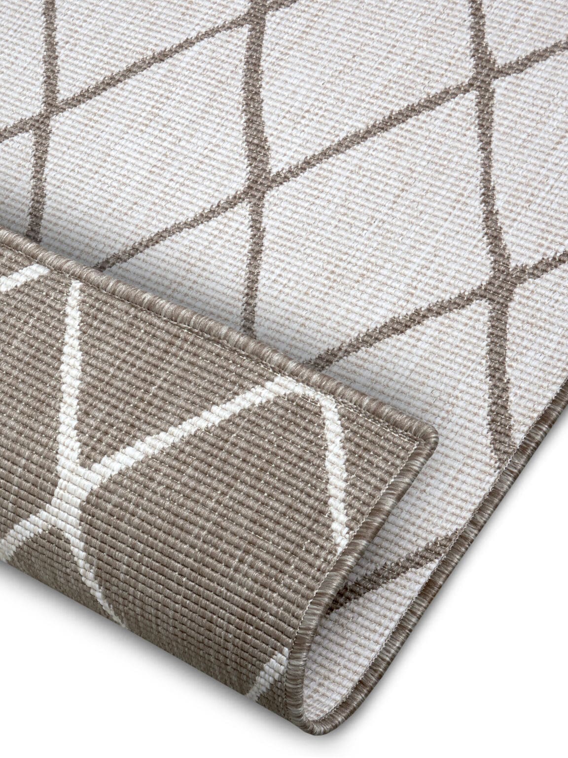 Twin tæppe i farven Beige lavet af 100% Polypropylen med en bagside af Polypropylen