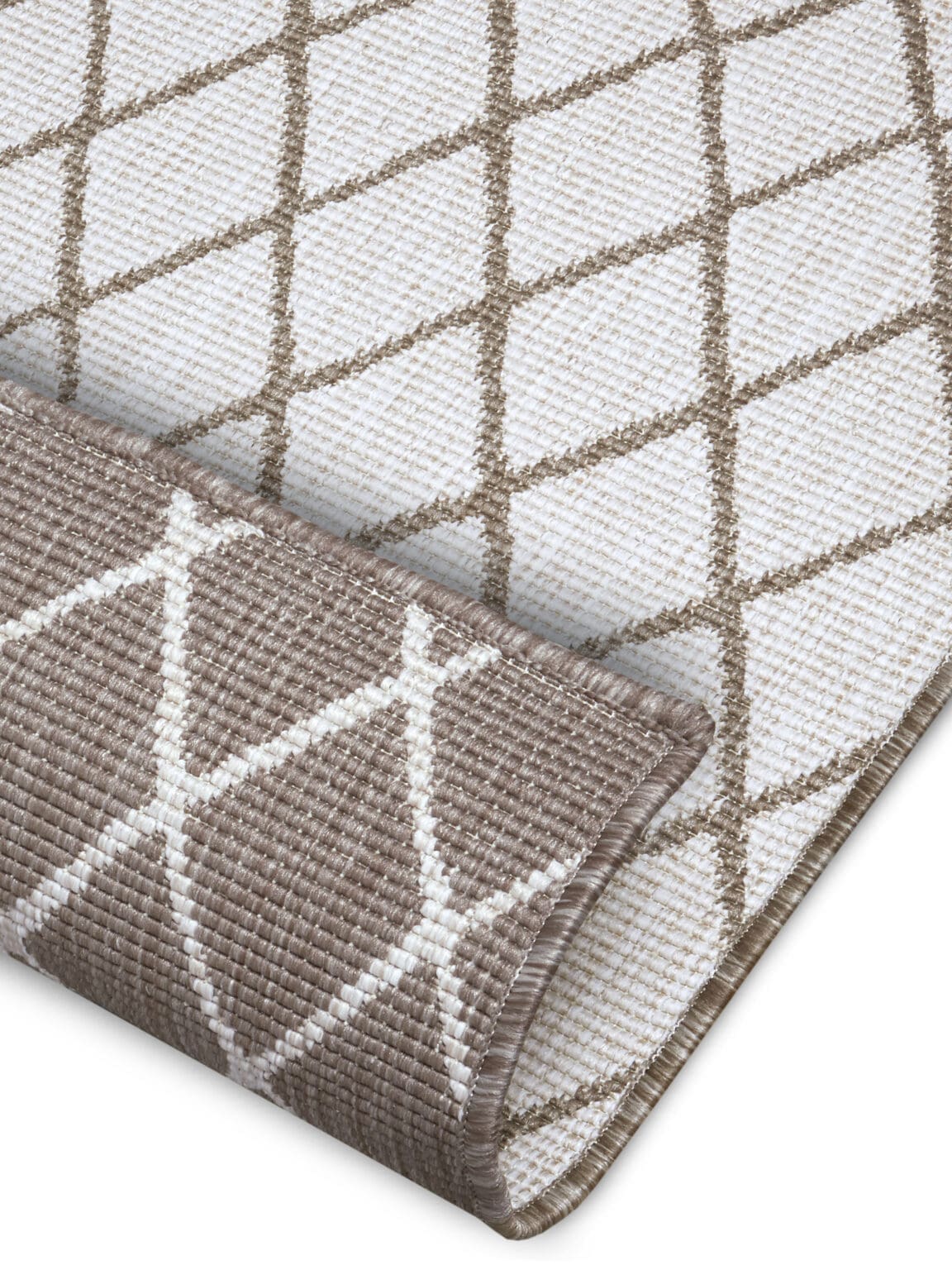 Twin tæppe i farven Beige lavet af 100% Polypropylen med en bagside af Polypropylen