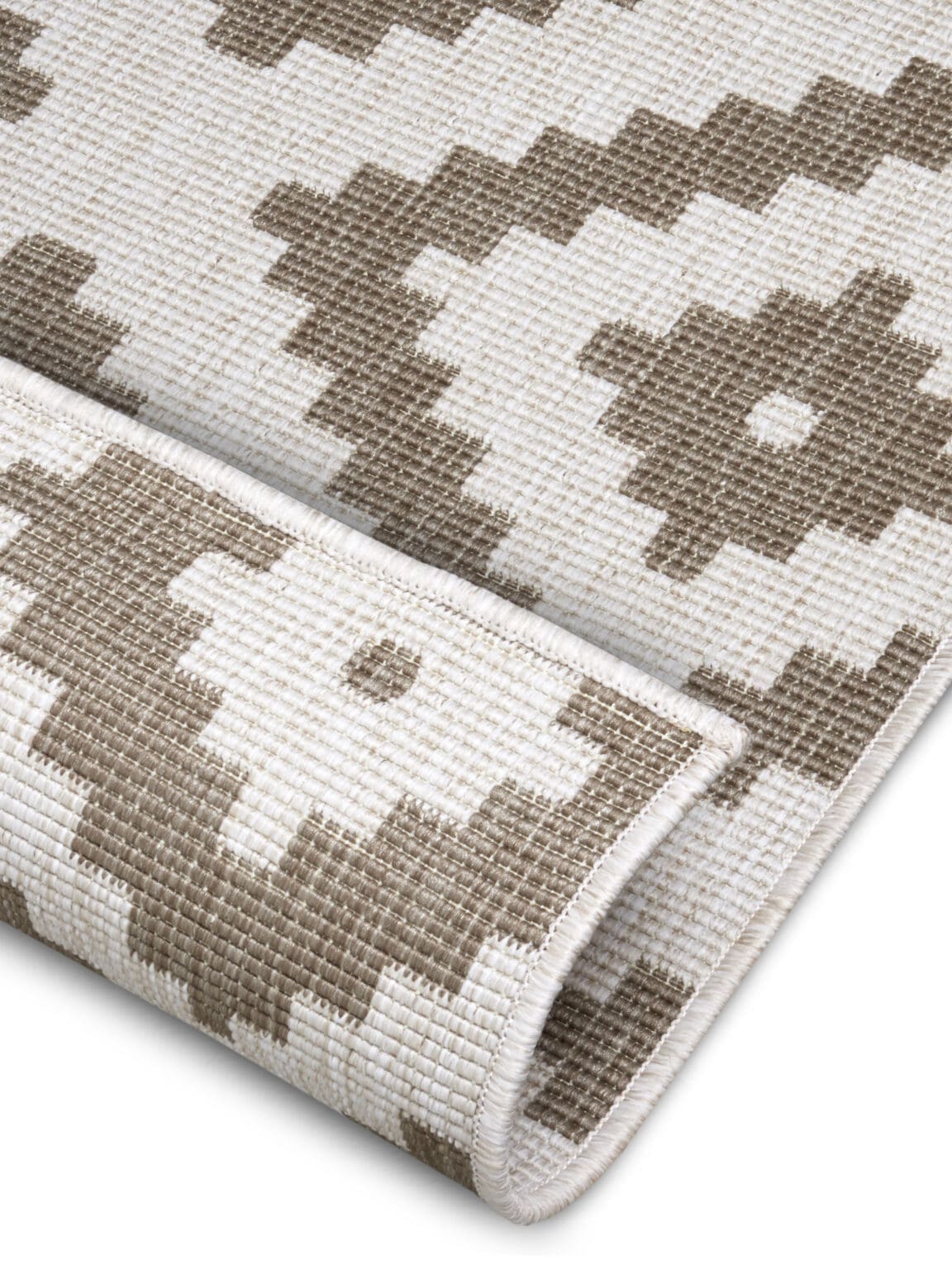 Twin tæppe i farven Beige lavet af 100% Polypropylen med en bagside af Polypropylen