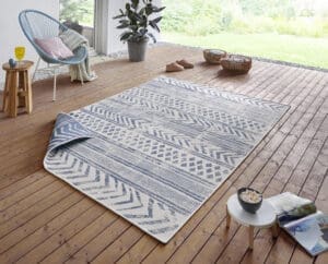 Twin Supreme tæppe i farven Blå Creme lavet af 100% Polypropylen med en bagside af Polypropylen